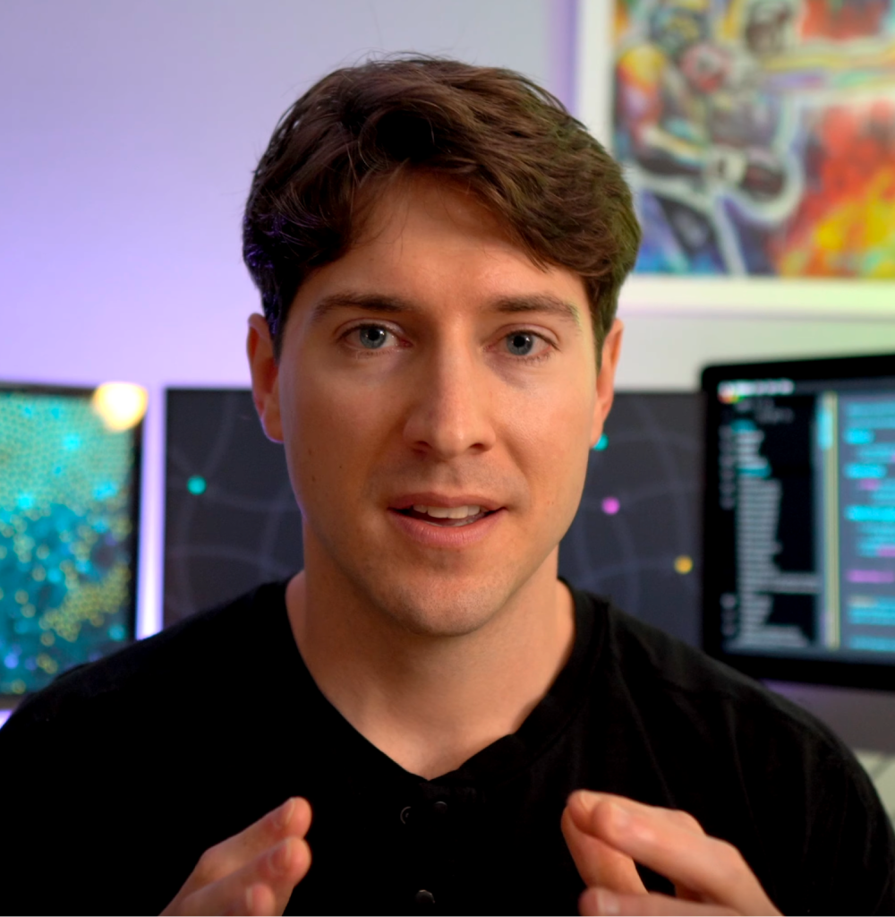 Foto de Nick Milo mirándote fijamente mientras comparte una idea. Tienes pantallas con el software Obsidian en el fondo.